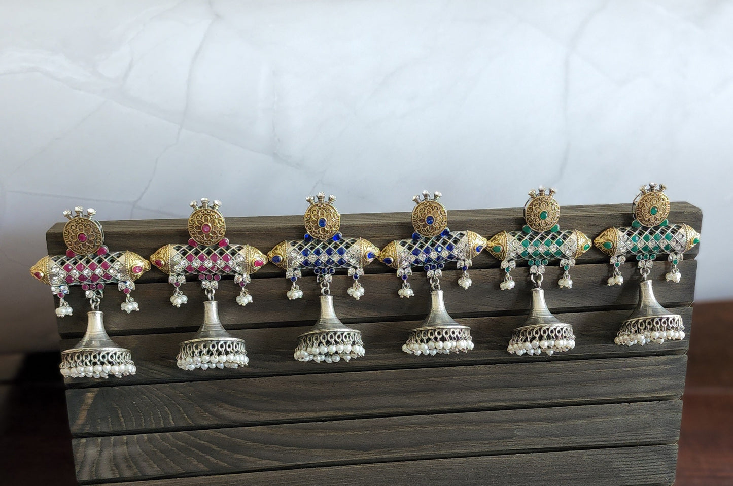 Aastha dualtone jhumka earrings