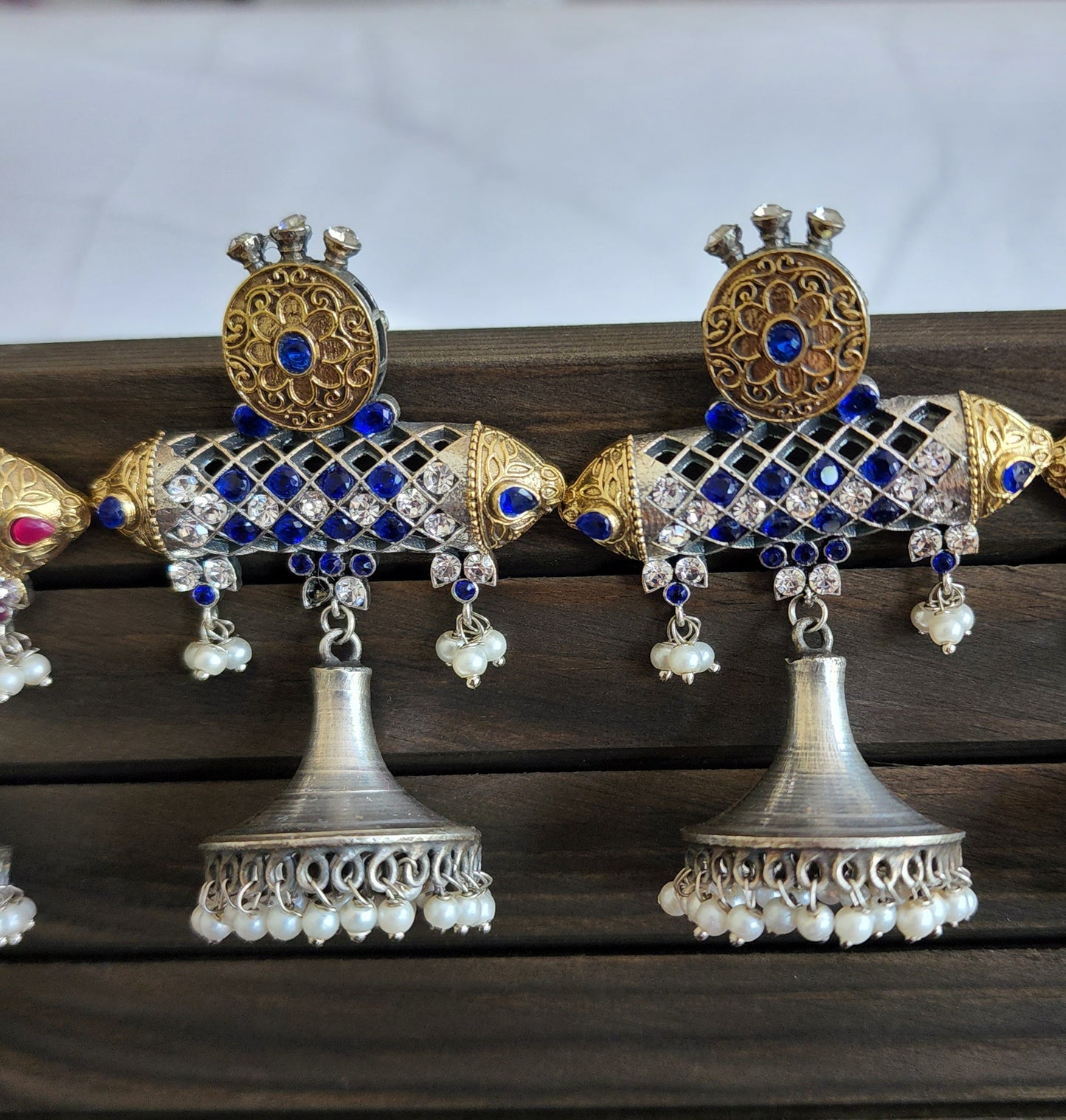 Aastha dualtone jhumka earrings