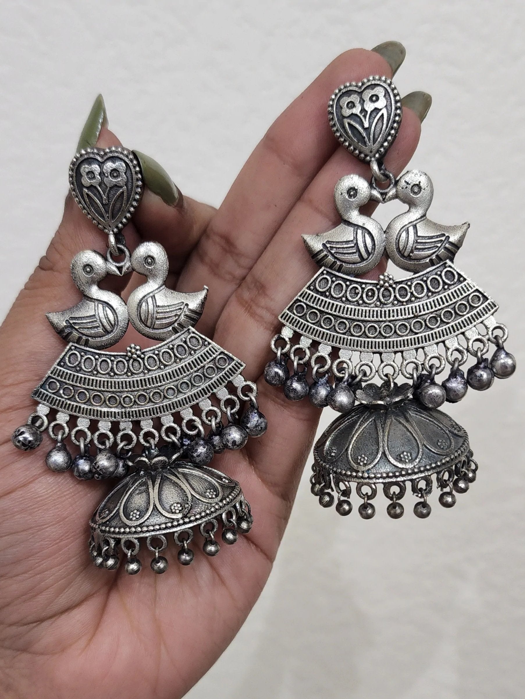 Bird silver alike unique jhumka earrings
