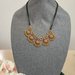 Bhanu Gold plated black bead necklace
