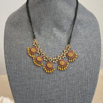 Bhanu Gold plated black bead necklace