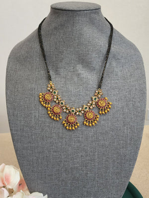 Bhanu Gold plated black bead necklace