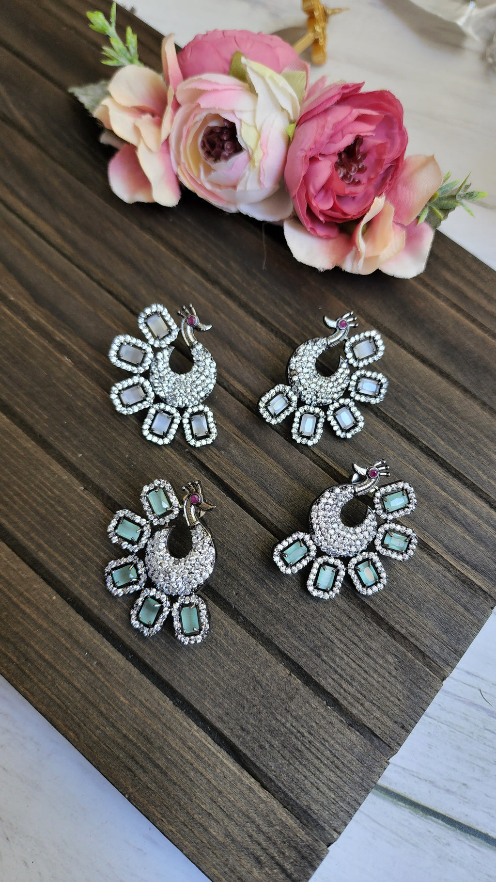 CZ peacock stud earrings