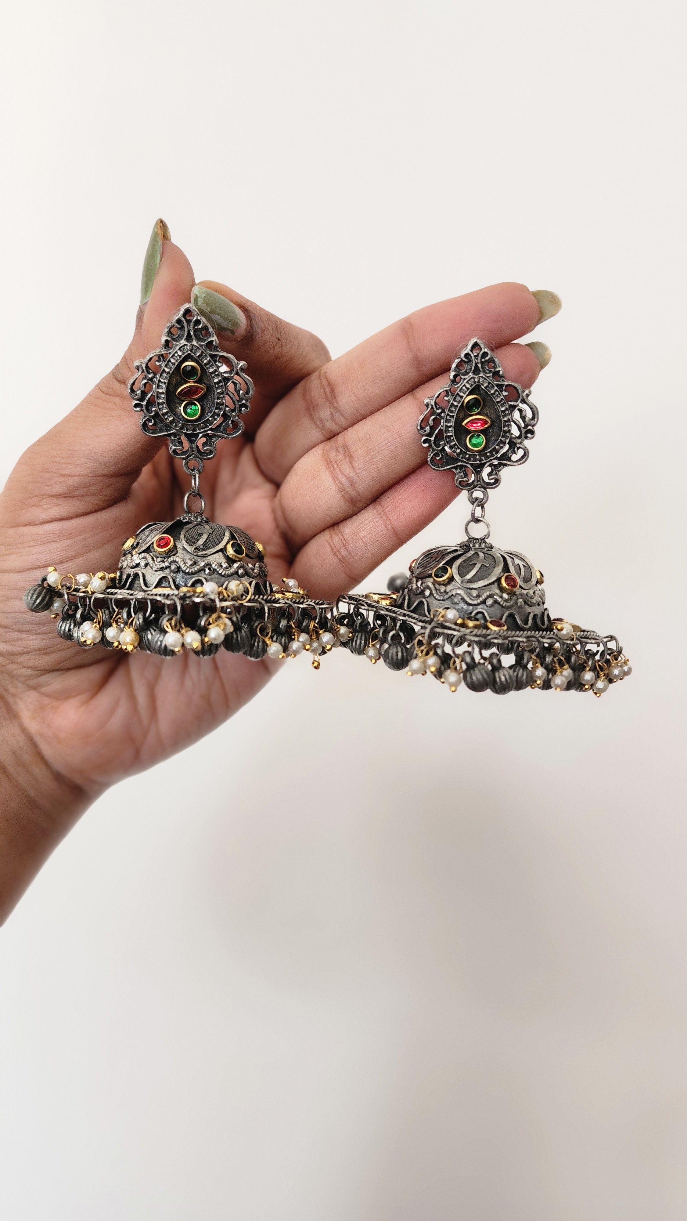 Black metal jhumkas earrings