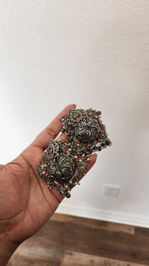 Black metal jhumkas earrings