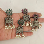 Poorvi silver alike earrings