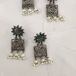 Poorvi silver alike earrings