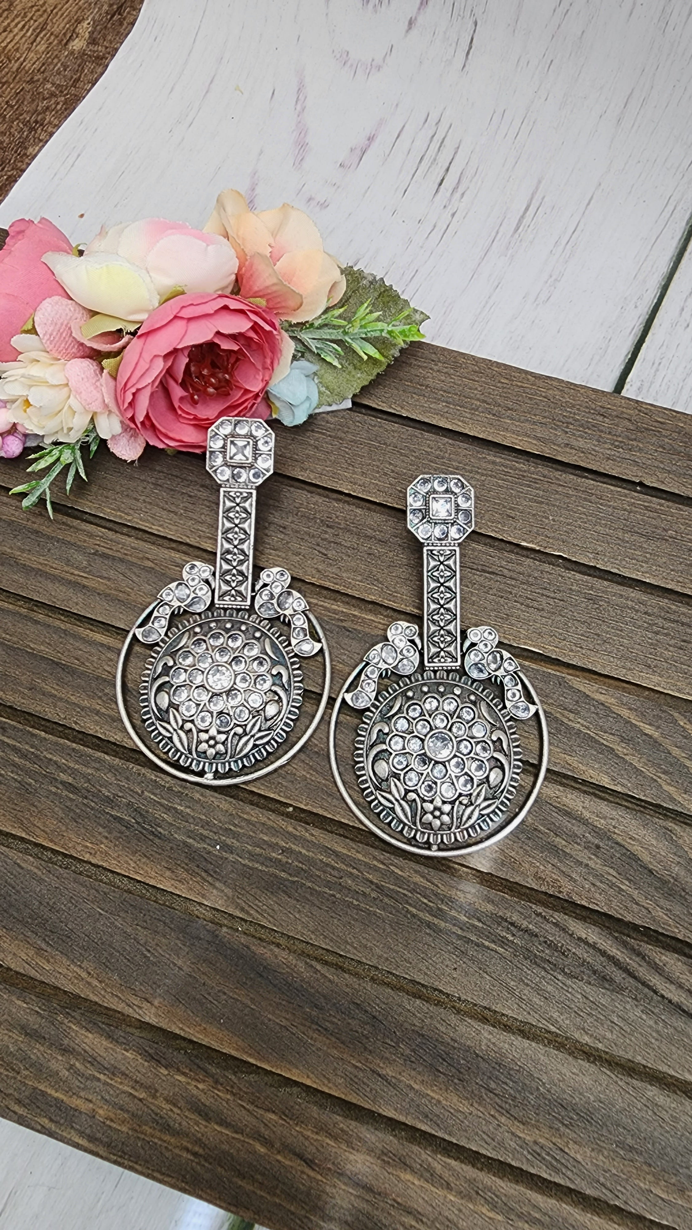 Silver alike chandbali earrings