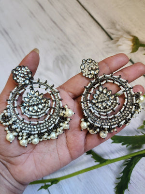 Black rodium plated jhumka earrings