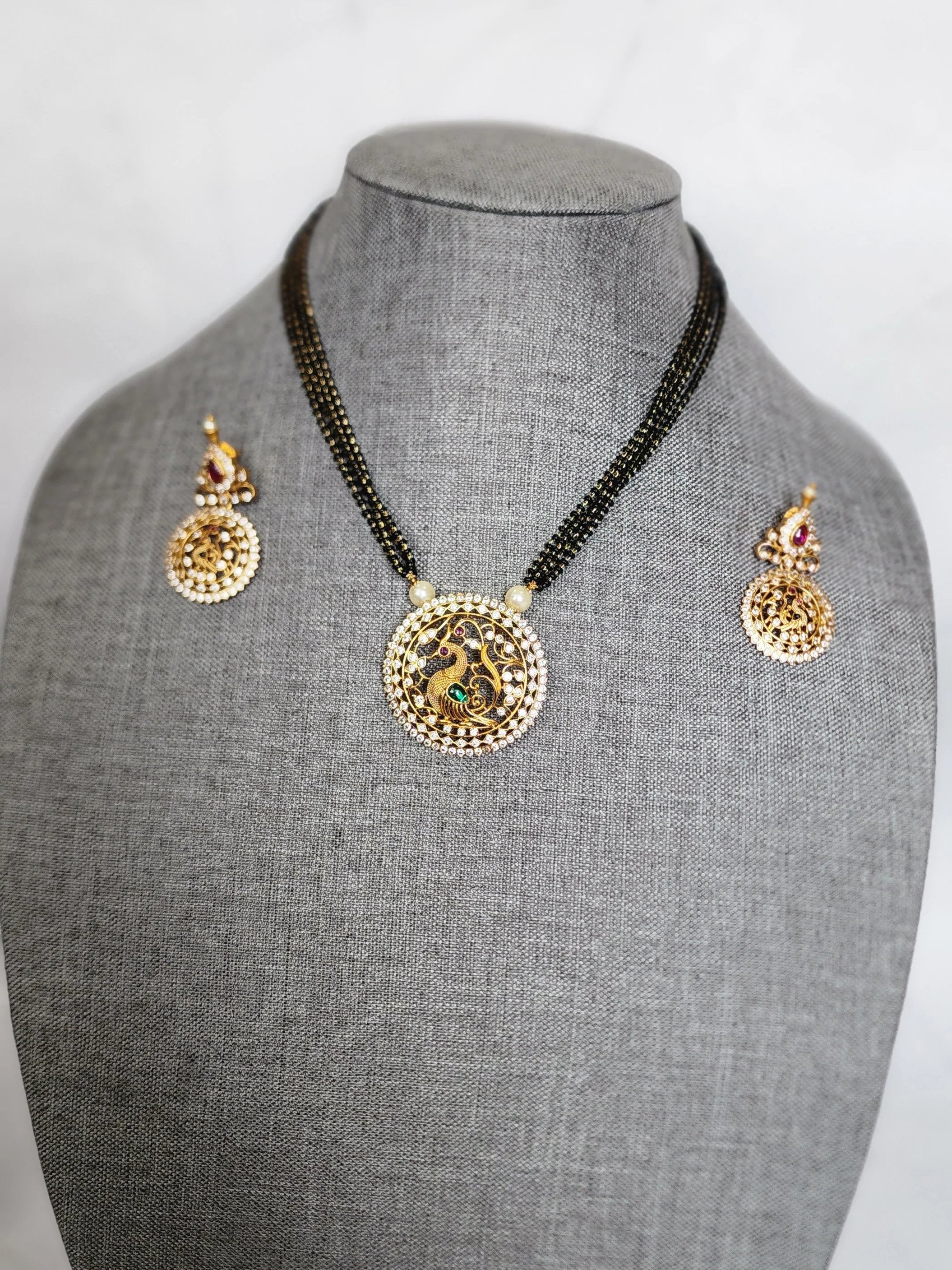 Bhuvi Gold plated black bead necklace set