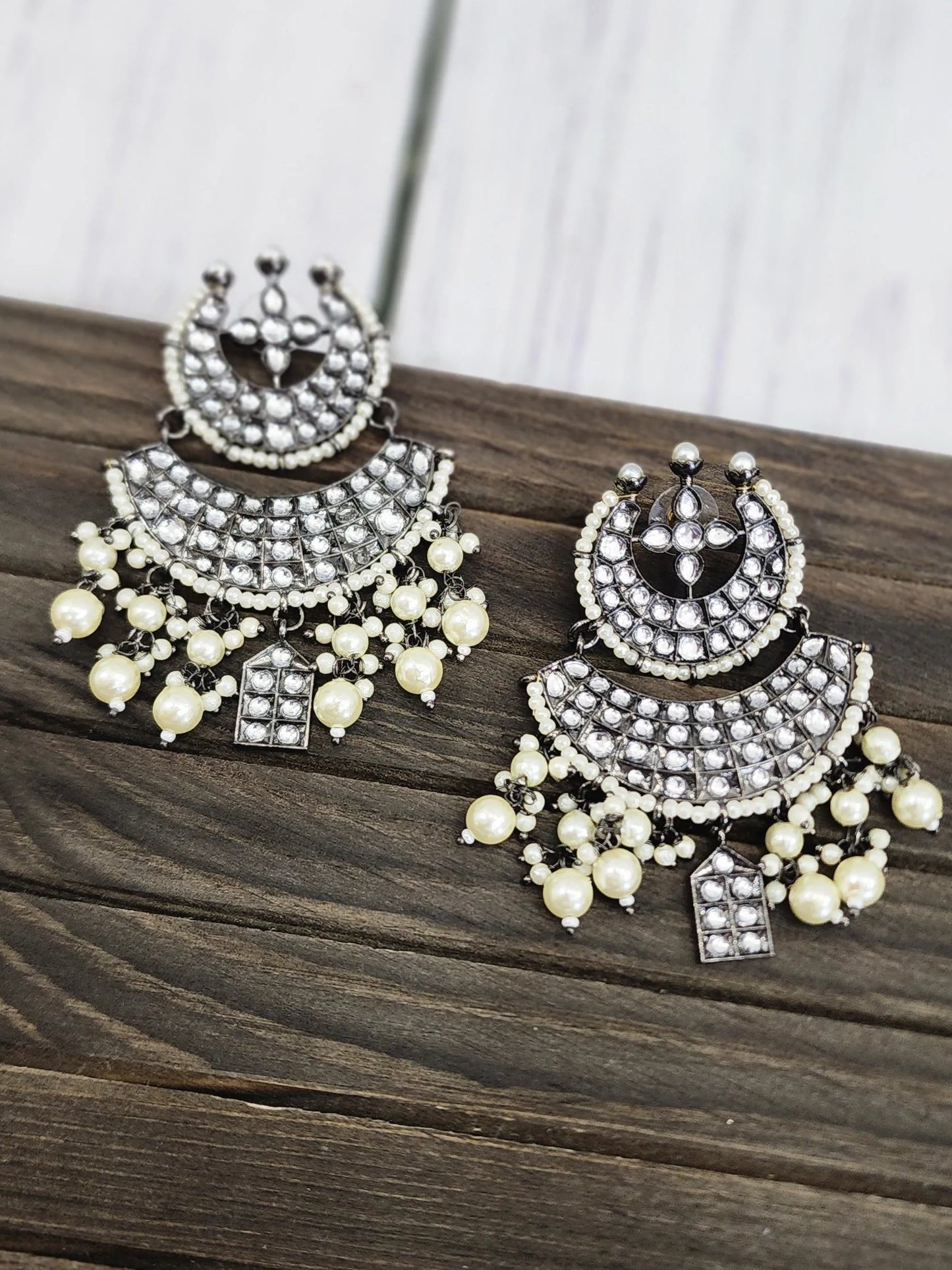 Black rodium plated jhumka earrings