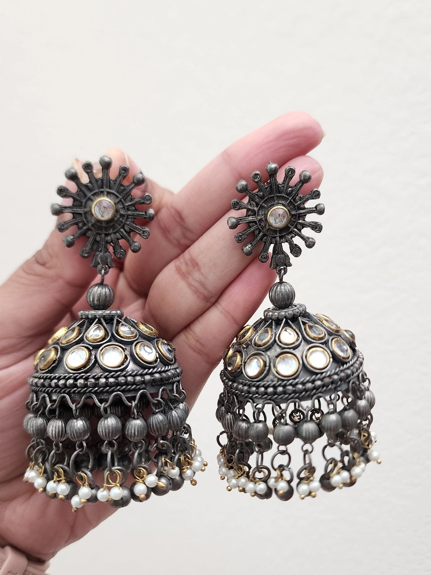 Black metal jhumkas earrings