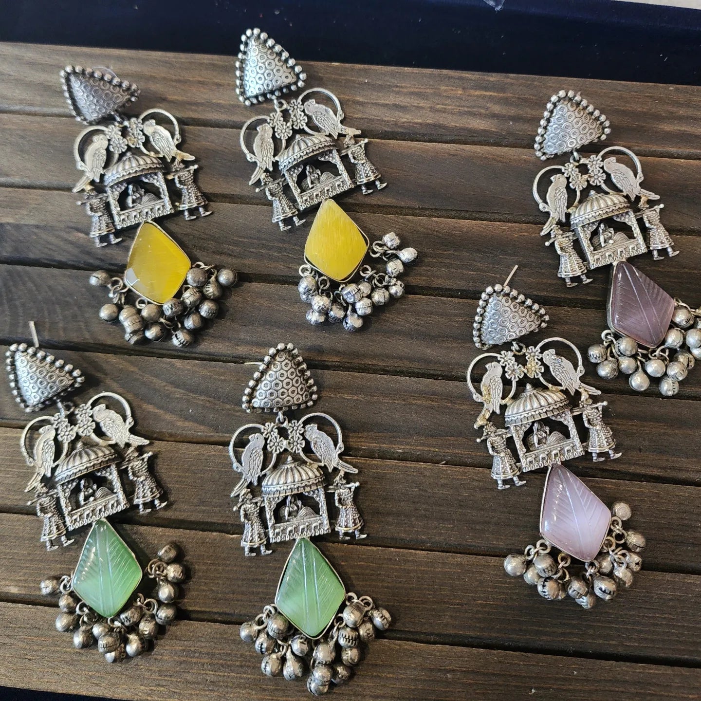Ridhi silver polish fusion jhumka earrings
