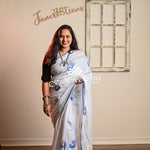 Pure Linen White saree with Zari border and embroidered Peacocks saree