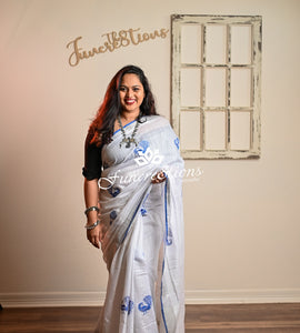 Pure Linen White saree with Zari border and embroidered Peacocks saree