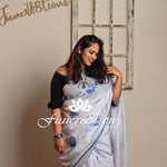 Pure Linen White saree with Zari border and embroidered Peacocks saree