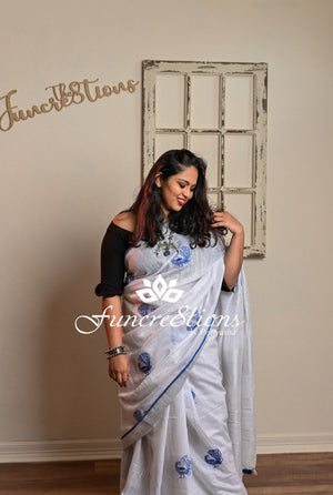 Pure Linen White saree with Zari border and embroidered Peacocks saree