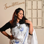 Pure Linen White saree with Zari border and embroidered Peacocks saree